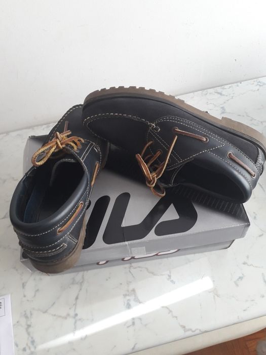 Sapatos usados em bom estado