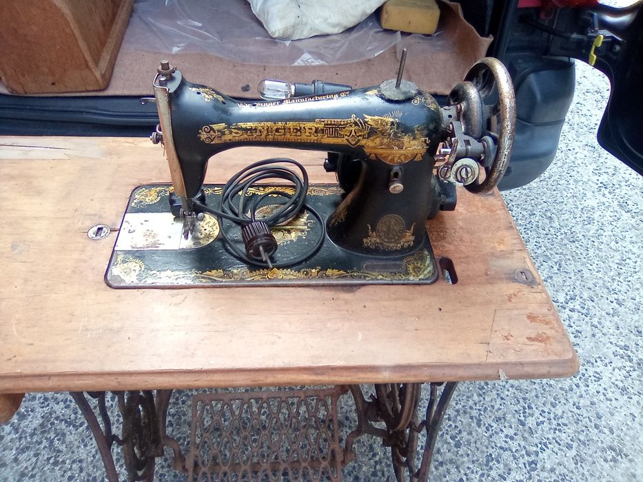 Máquina de costura singer