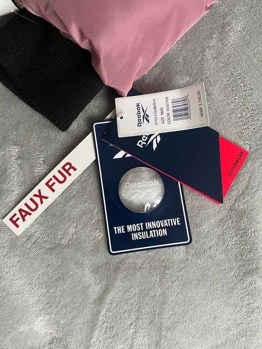 Жіноча пухова куртка Reebok (S-M)