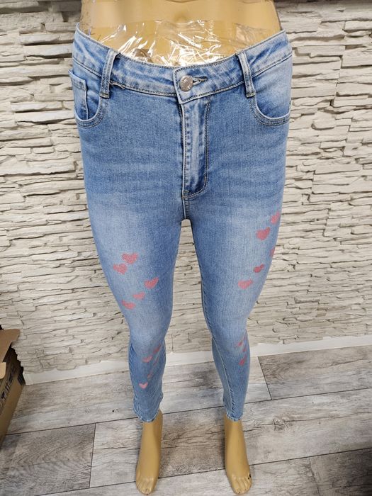 Nowe z metką przepiękne spodnie jeansowe w serduszkami Only one day ro