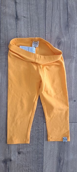 Leginsy 3/4 pomarańczowe r.110