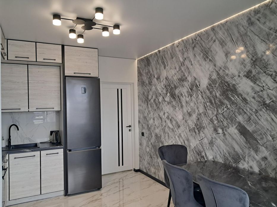 Е-Оселя, 1-к, Б. Хмельницького,57