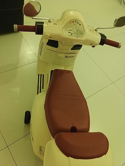 Mota vespa criança