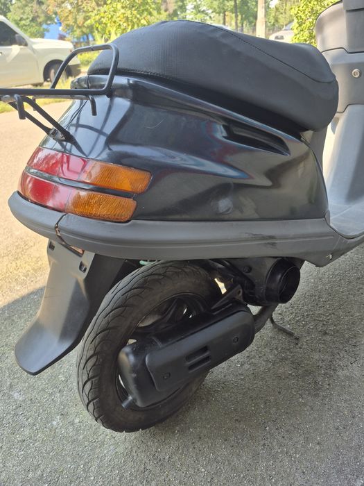 Скутер Honda Tact.