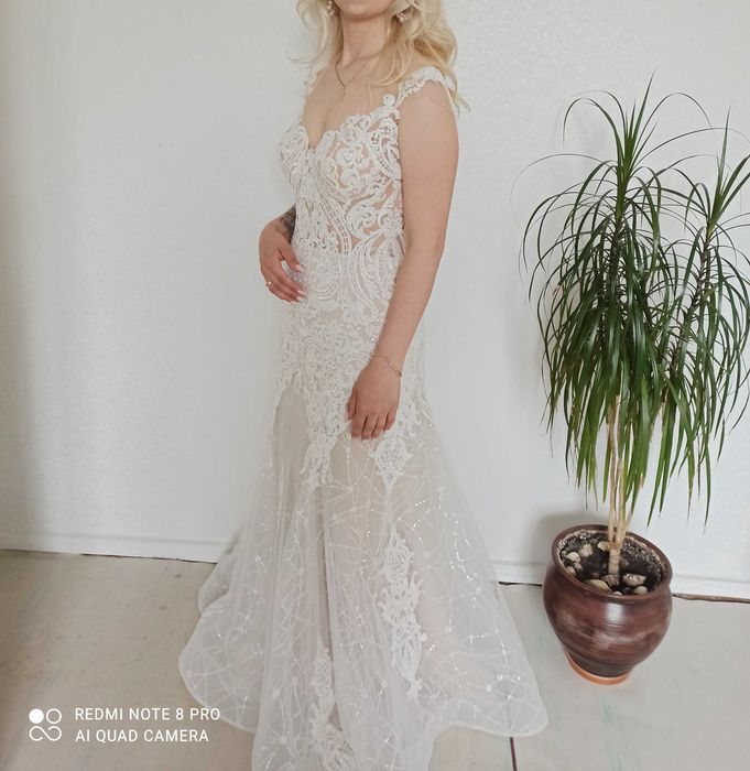Дизайнерська весільна сукня