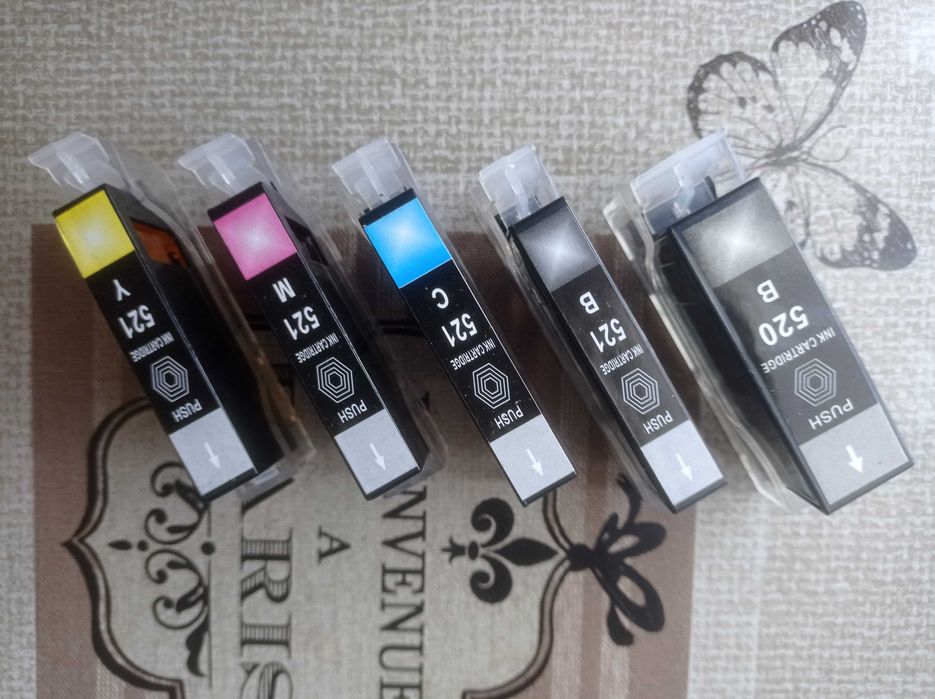 Продам комплект картриджів Canon 520/521 з авточіпами.