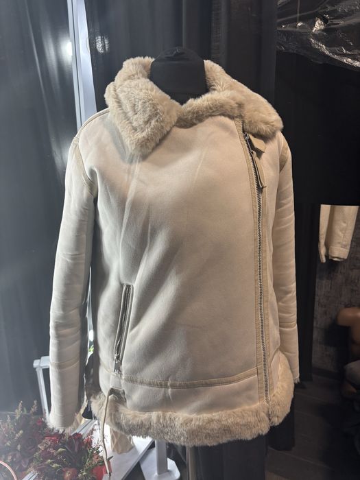 Дубленки теплі нові
