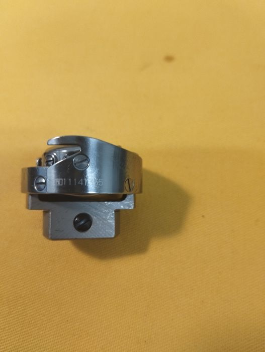 Orginalny chwytacz do stębnówek Juki