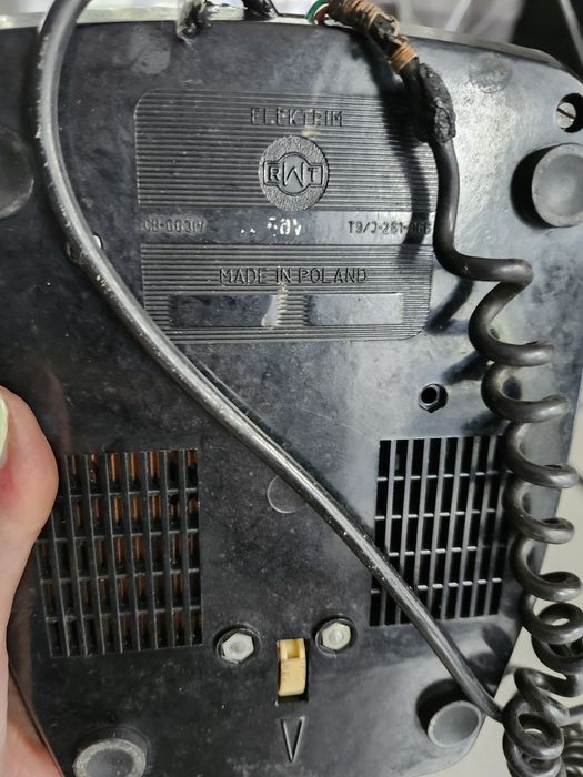 Czarny telefon stacjonarny tarczowy z czasów PRL RWT
