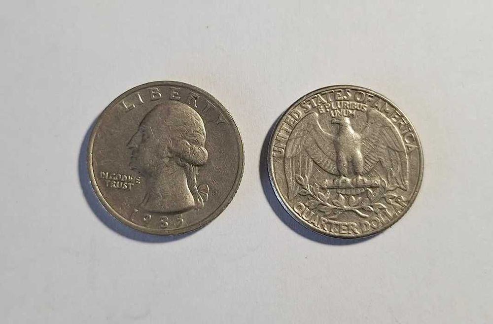 Duas moedas de um quarto de dólar