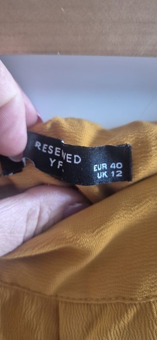 Szerokie spodnie Reserved rozm. 40