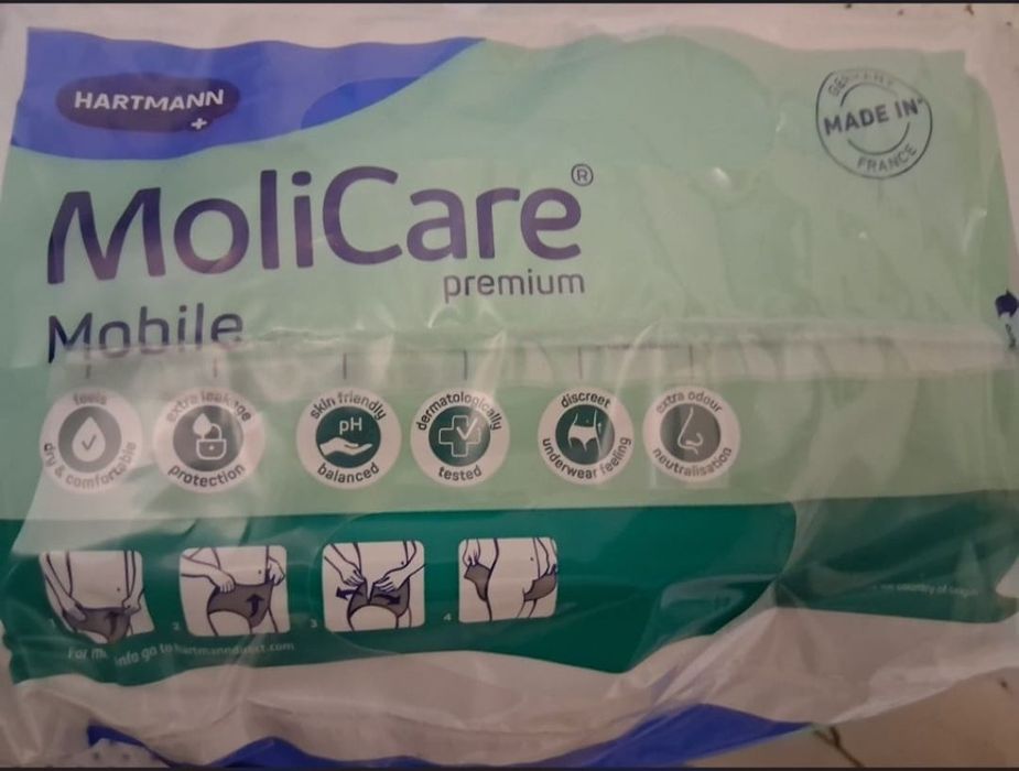 Vendo 3 embalagens de fraldas molicare