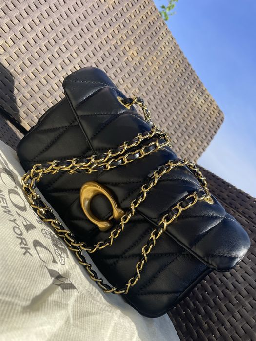 Bolsa coach preta