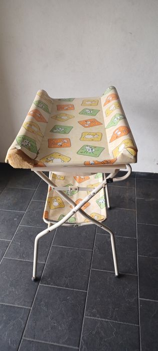 Muda fraldas com banheira