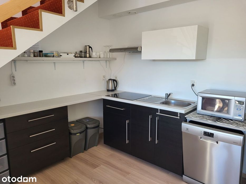 Przestronny apartament z balkonem i windą nad jeziorem Pluszne