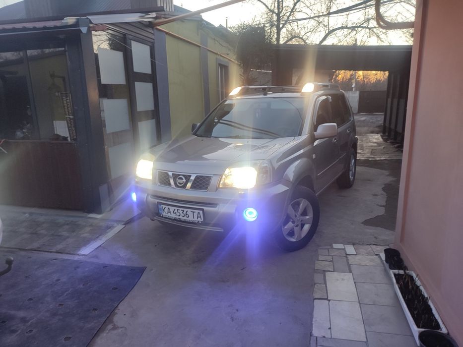 Nissan.   X Trail