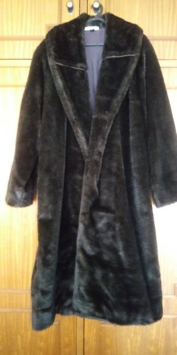 Casaco em pêlo com aplicações em pele genuína