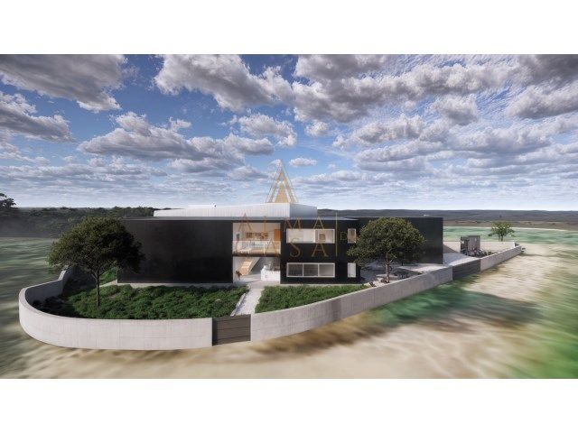 Terreno com projeto para construção de armazém em São Pedro da Cova