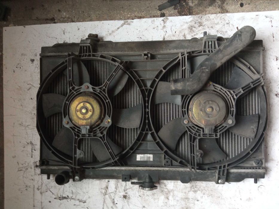 Радіатор вентилятор двигуна Nissan Primera P12 2.2 21400EDZ00 Розборка