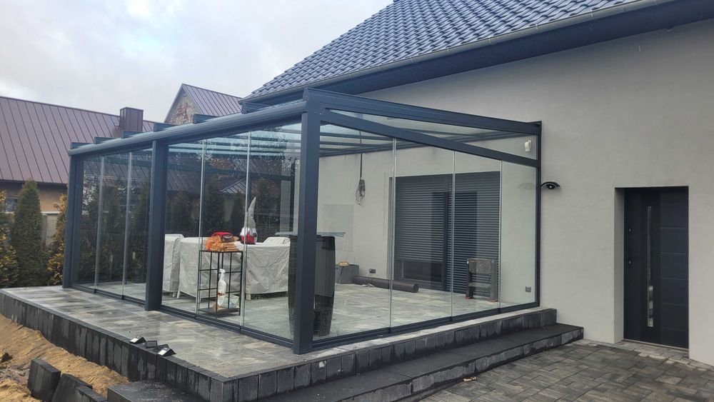 Przeszklone tarasy, zadaszenia, systemy szyb przesuwnych