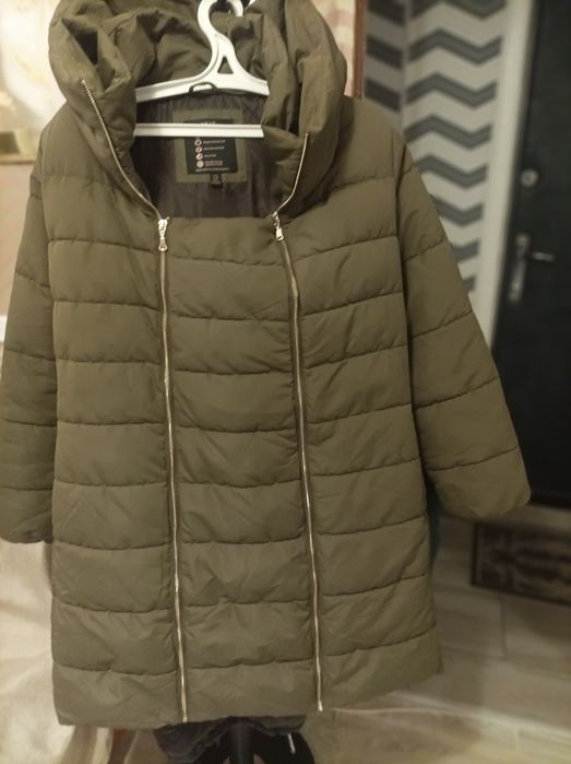 Продам новый пуховик Next р.52-54