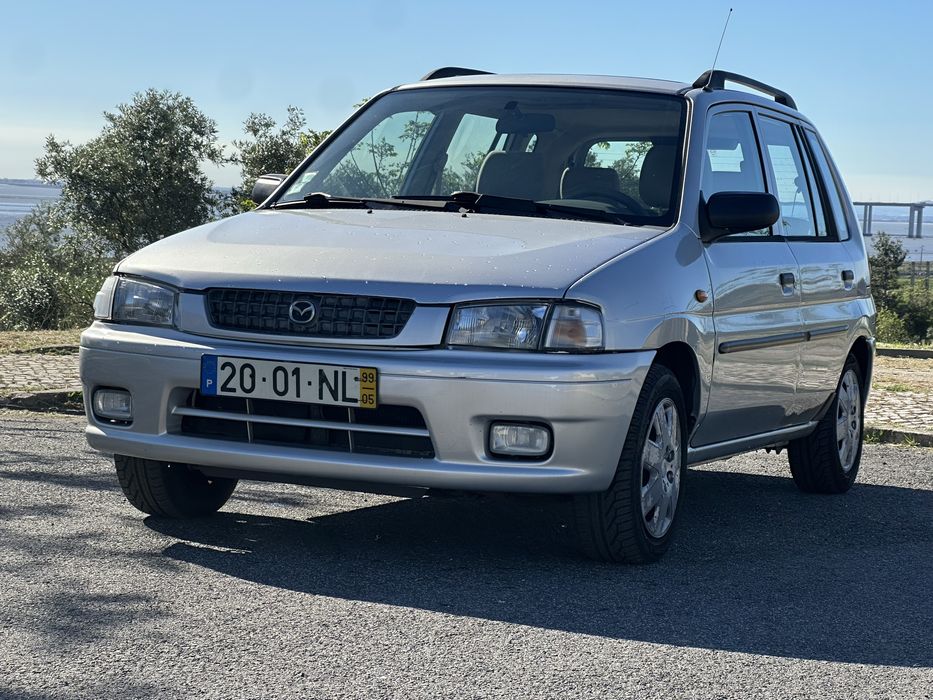 Mazda Demio 1.3 Glx de 1999 a gás