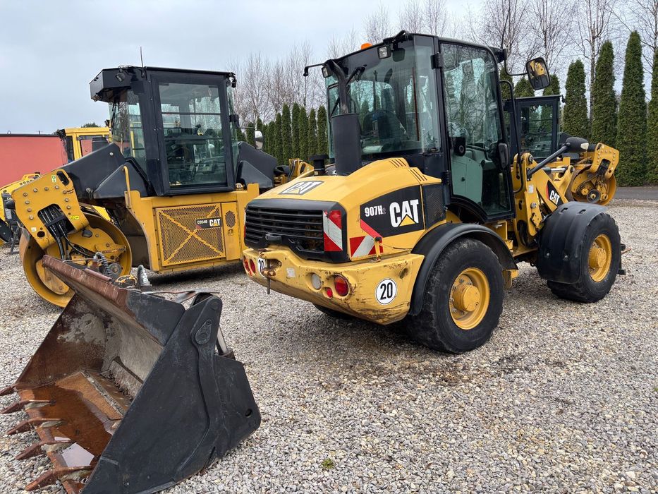 Caterpillar 907H2 rekin 4x4 łyzka dzielona z niemiec  Ładowarka cat 907H2 rok 2013r widły, rekin, szybkozlacze z niemiec