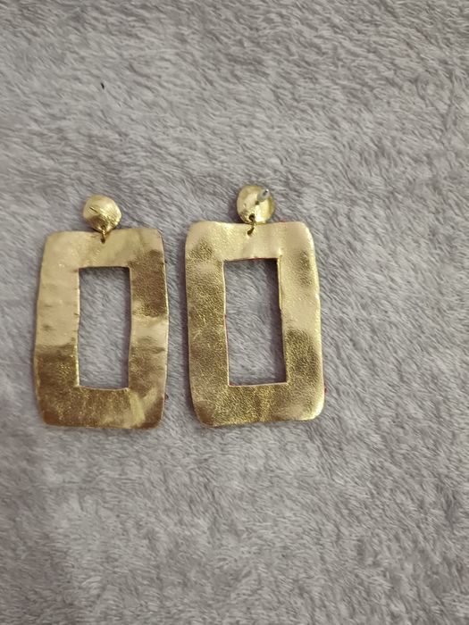 Brincos coloridos como novos