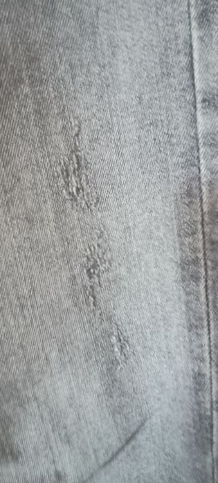 Spodnie jeans szare z zameczkami