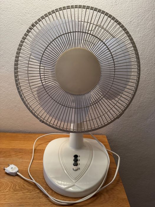 Fan for desk of room.
