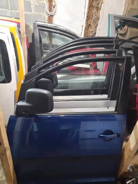 продам дверки до  CADDY та  TOURAN Passat