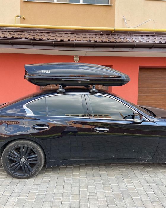 Оренда автобоксу Thule на дах та фаркоп бокс на прокат туле поперечини