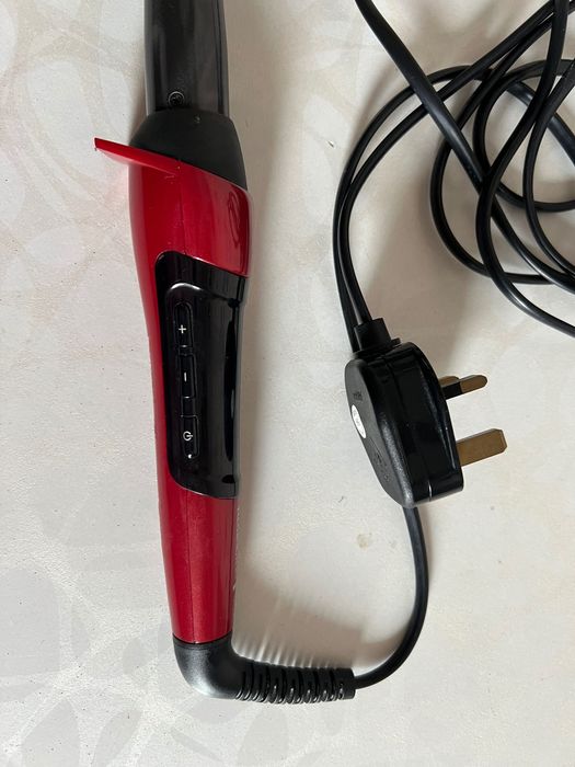 Конусна плойка Remington