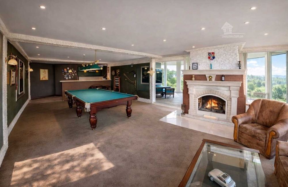 Дом 800 кв. VIP-уровня.Бассейн с подогревом, сауна, бильярд,генератор.