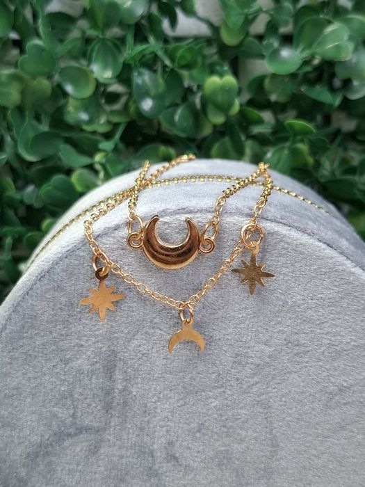 Комплект браслетів з підвісками