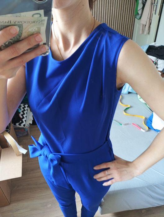 Zadbany granatowy kombinezon rozmiar S