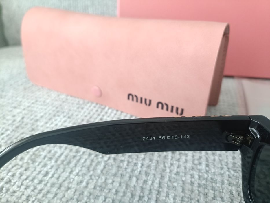 Óculos de sol miu miu