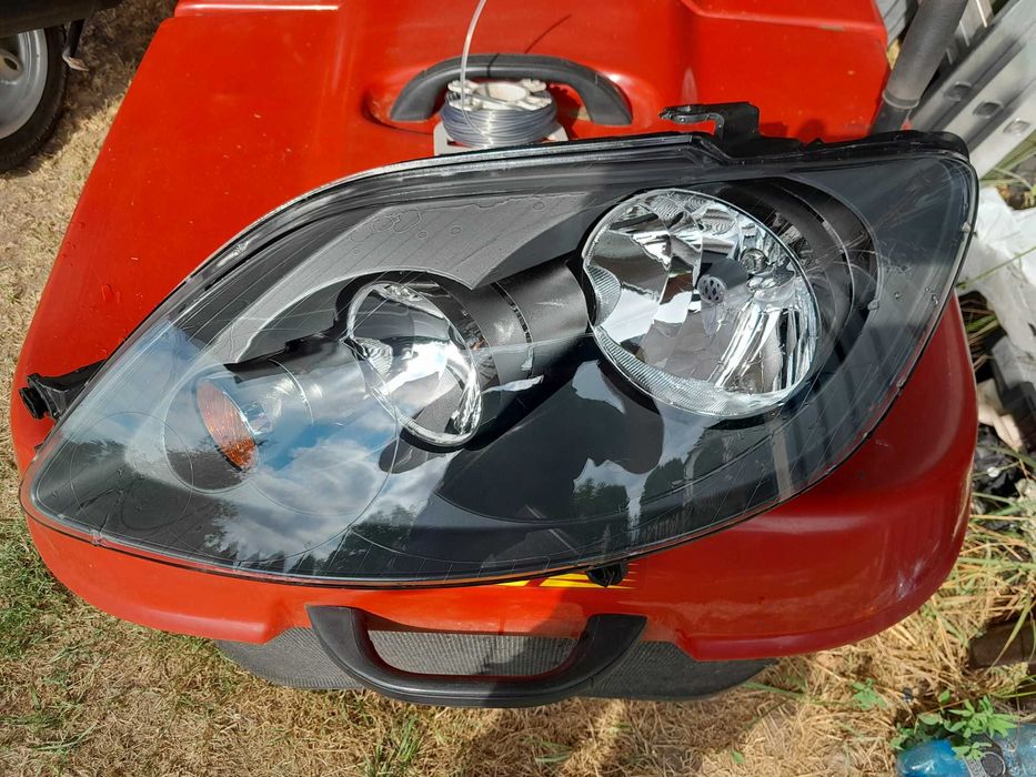 Lampa lewa golf Plus Nowa