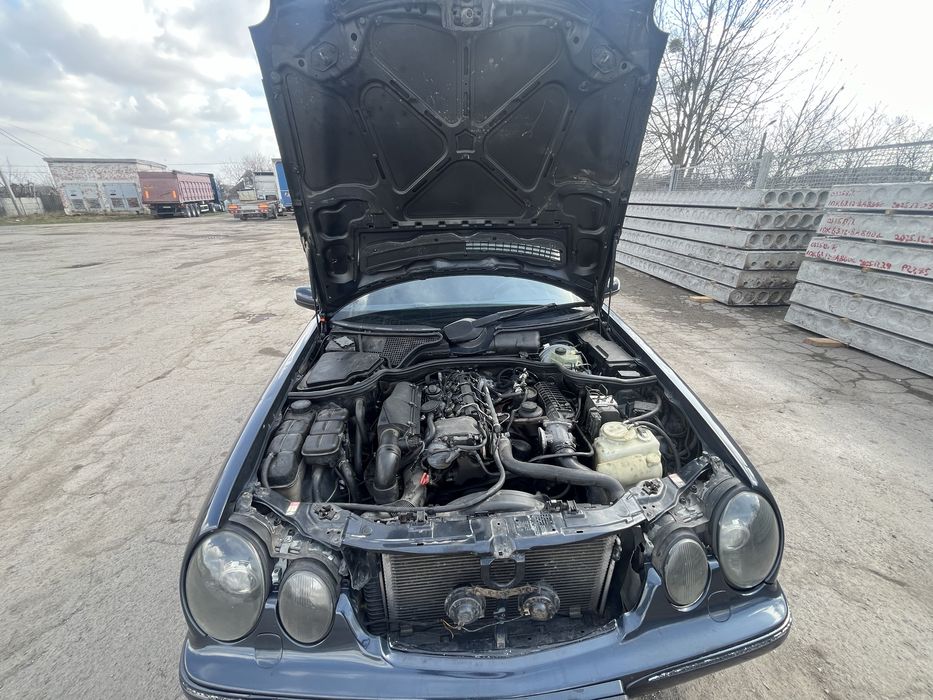 Мерседес Бенз 210