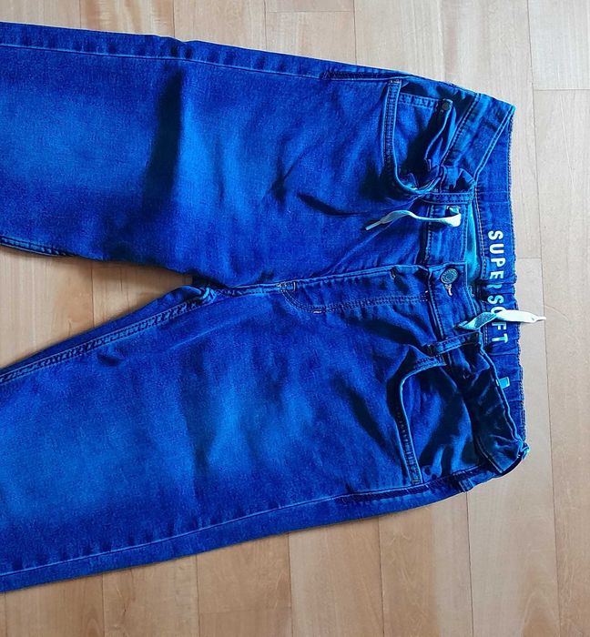 Spodnie jeansowe Smyk r.164