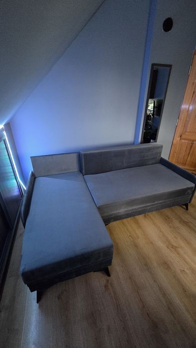 Szary narożnik z funkcją spania (140x200)