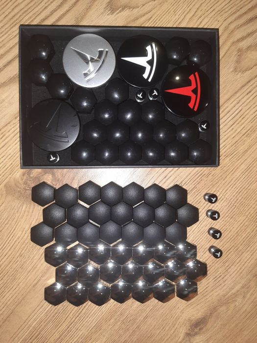 Ковпачки Тесла. Заглушки на диски та емблеми на ковпаки Tesla