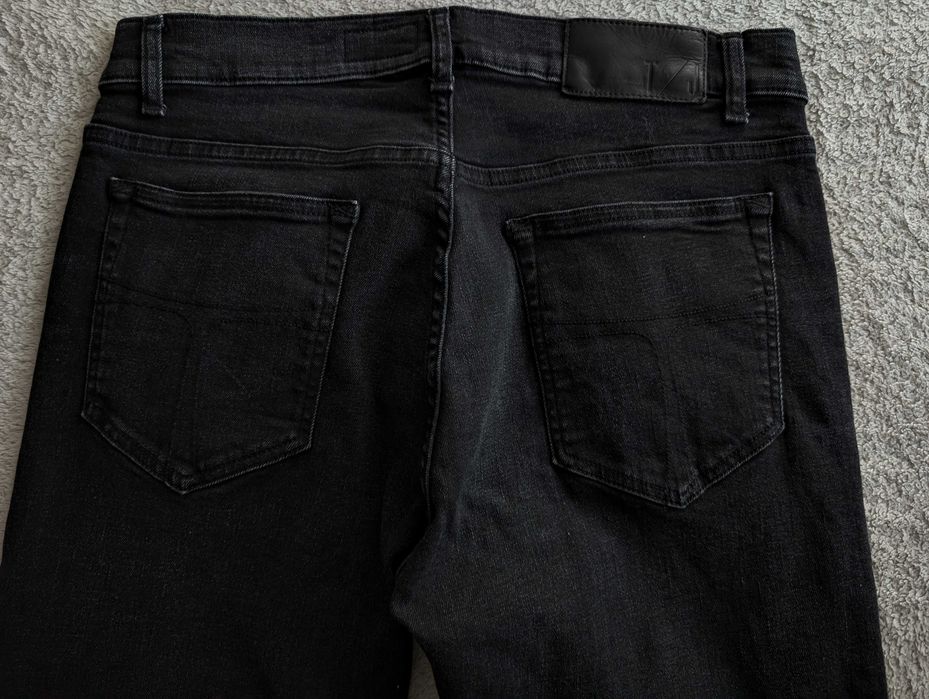 Czarne spodnie jeansowe jeansy slim Tiger of Sweden 31/32 jak nowe