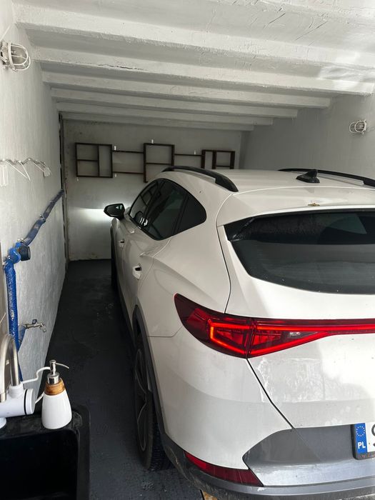 murowany garaż z kanalem