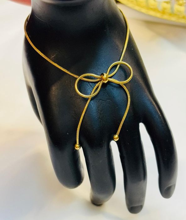 Złota bransoletka kokarda żyłka stal chirurgiczna nierdzewna