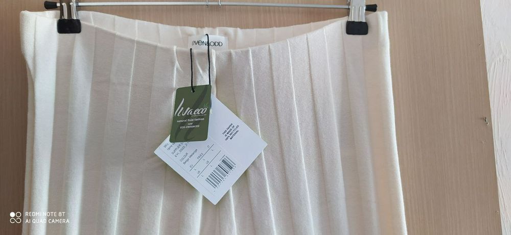 Брюки молочно- белого цвета