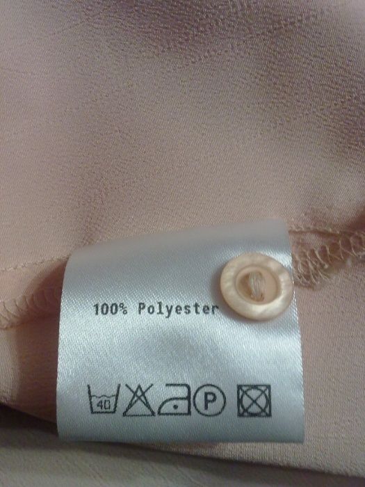 Стильная блуза нежно-персикового цвета