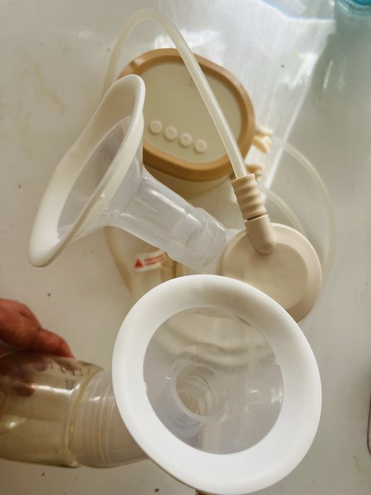 Bomba dupla de extração de leite com Bomba de extração de leite manual gratuita