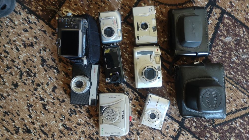 Olimpus Фотоопарати