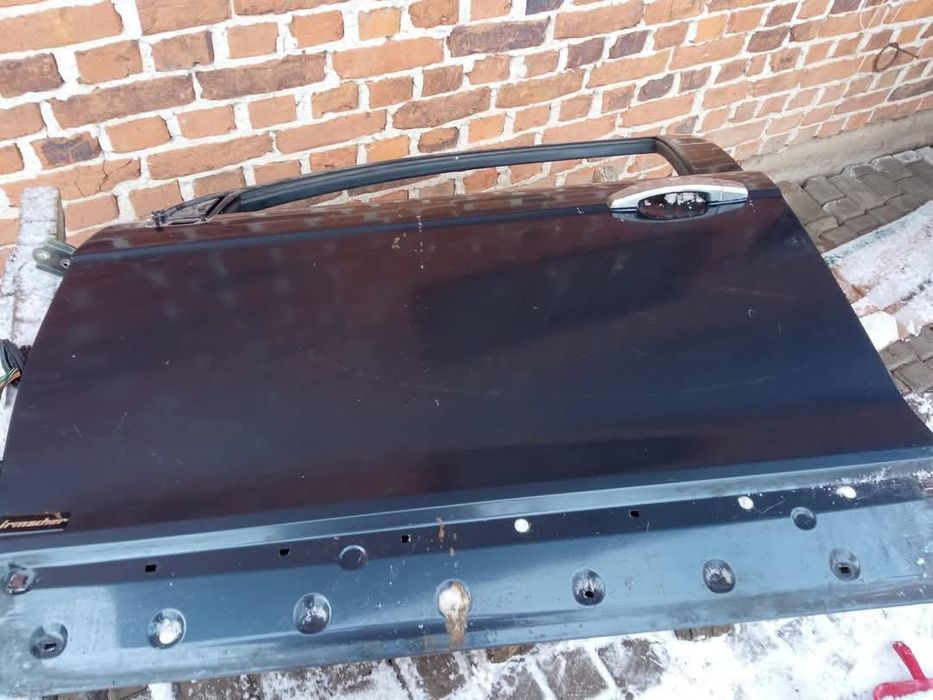 Двері Шевроле каптіва с100